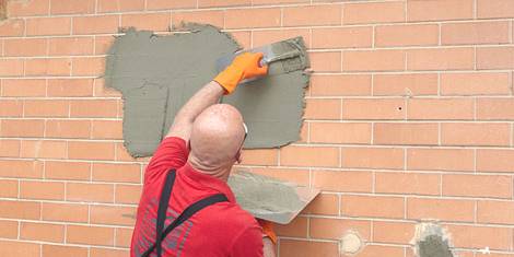 gevel bekleden met cement